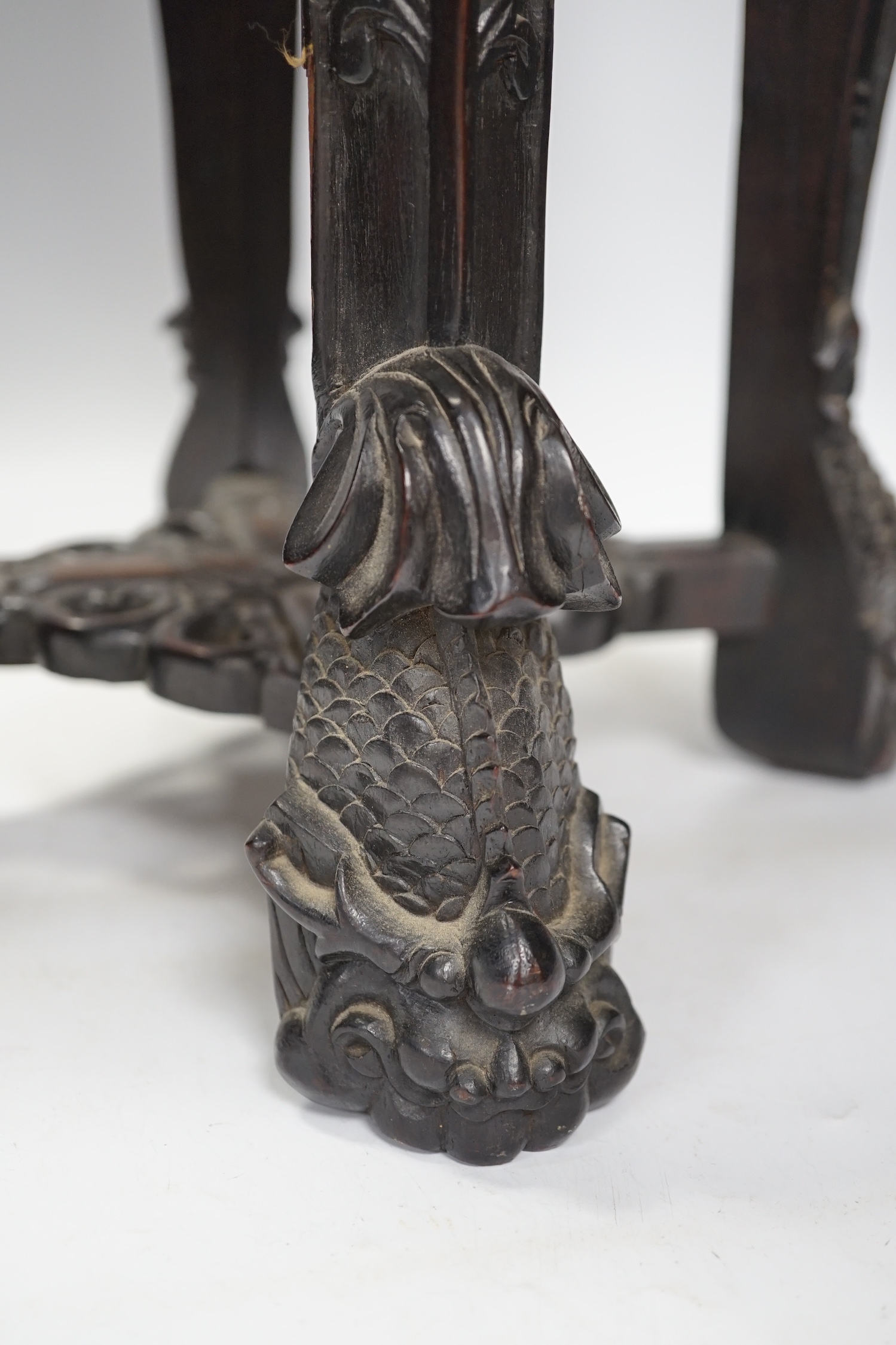 A Chinese hongmu stand, with inset marble top, 42cm high. Condition - poor to fair, section of frieze missing